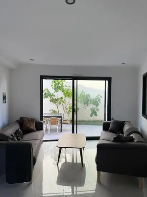 Coin salon dans l'établissement Maison de la Pornicaise 13