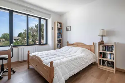 Un ou plusieurs lits dans un hébergement de l'établissement Villa pour 15 à 700m de la plage