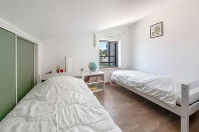 Un ou plusieurs lits dans un hébergement de l'établissement Villa pour 15 à 700m de la plage