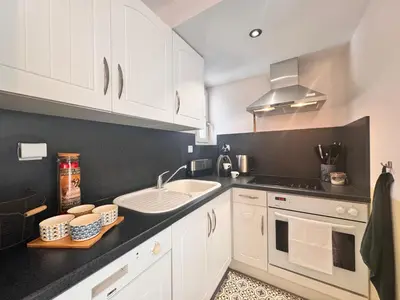 Cuisine ou kitchenette dans l'établissement La Maison du Golf - Jardin - Piscine - 4p