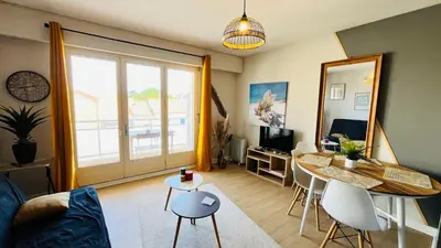 Coin salon dans l'établissement Appartement bord de mer