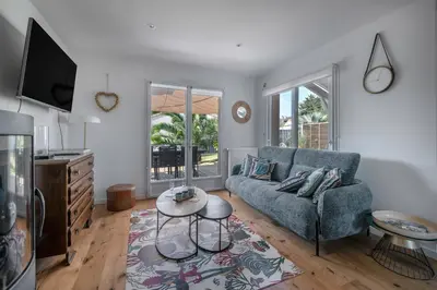 Coin salon dans l'établissement Maison familiale pour 8 pers - 400m de la plage
