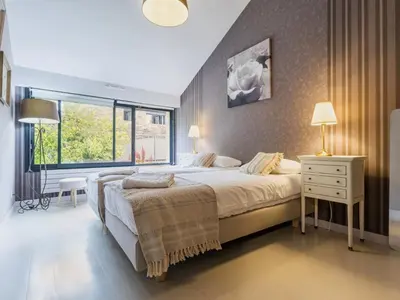 Un ou plusieurs lits dans un hébergement de l'établissement Maison spacieuse avec piscine chauffée, animaux admis - FR-1-306-1314