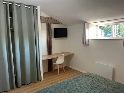 Télévision ou salle de divertissement dans l'établissement Relais de la Clartière