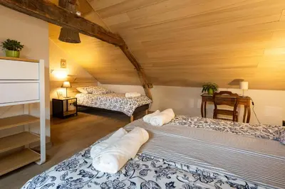 Un ou plusieurs lits dans un hébergement de l'établissement Chambres d'hôtes, table d'hôtes des Reinières proche La Loire à Vélo, 3 chambres 7 couchages