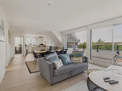 Coin salon dans l'établissement 180m de la plage appartement 4 adultes - 4 enfants