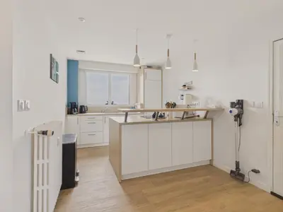 Cuisine ou kitchenette dans l'établissement 180m de la plage appartement 4 adultes - 4 enfants