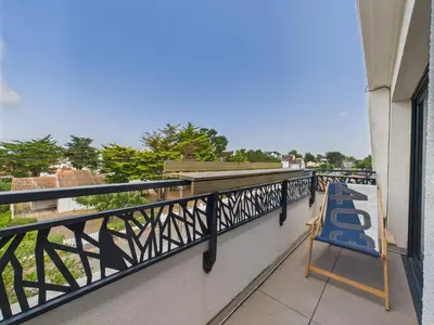 Balcon ou terrasse dans l'établissement 180m de la plage appartement 4 adultes - 4 enfants