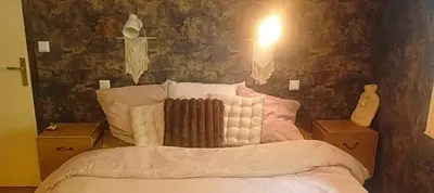 Un ou plusieurs lits dans un hébergement de l'établissement Maison au calme en bord de mer