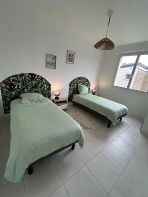 Un ou plusieurs lits dans un hébergement de l'établissement Appartement centre ville et proche mer