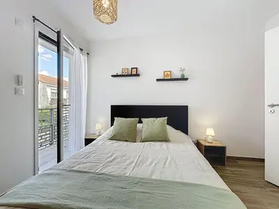 Un ou plusieurs lits dans un hébergement de l'établissement Apartment Océanide-2 by Interhome