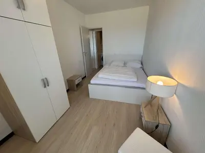 Un ou plusieurs lits dans un hébergement de l'établissement Appartement 2 pièces avec balcon face à la mer - Saint-Hilaire-de-Riez - FR-1-224C-359