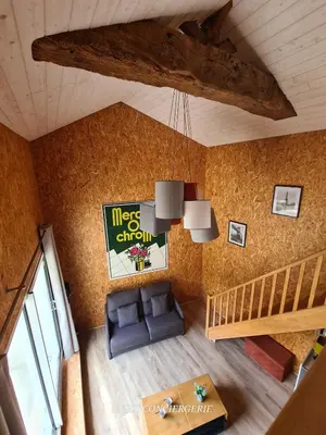 Coin salon dans l'établissement La Grange Gîte avec piscine proche Puy duFou