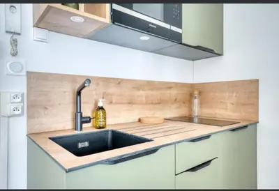 Cuisine ou kitchenette dans l'établissement appartement cœur de Nantes