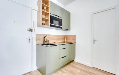 Cuisine ou kitchenette dans l'établissement appartement cœur de Nantes