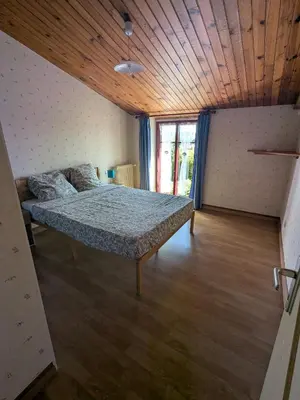 Un ou plusieurs lits dans un hébergement de l'établissement Chambres à La Flocellière, à 15min du PuyduFou