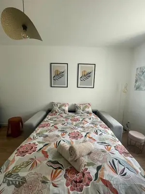 Un ou plusieurs lits dans un hébergement de l'établissement Maison 3 chambres 4 minutes du Puy
