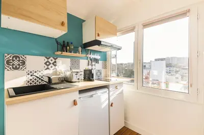 Cuisine ou kitchenette dans l'établissement Studio Bel Ami - Nantes centre ville
