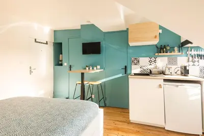 Cuisine ou kitchenette dans l'établissement Studio Bel Ami - Nantes centre ville