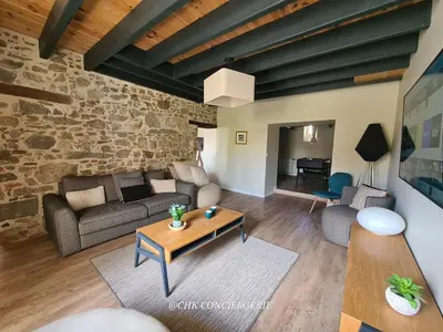 Coin salon dans l'établissement Maison de campagne HDH - Charme et moderne - Proche du Puy duFou