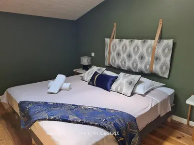 Un ou plusieurs lits dans un hébergement de l'établissement Maison de campagne HDH - Charme et moderne - Proche du Puy duFou