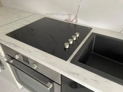 Cuisine ou kitchenette dans l'établissement Appartement à Saint Nazaire centre ville, proche plage