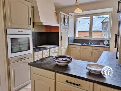 Cuisine ou kitchenette dans l'établissement Gîte des Alpagas, 10 personnes