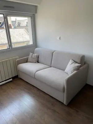 Coin salon dans l'établissement Nantes Center Flat 4 persons