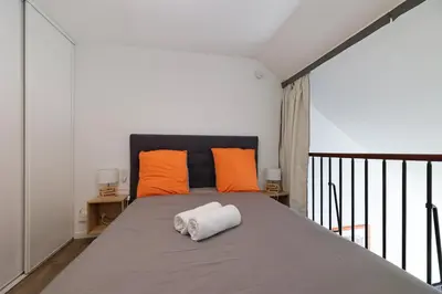 Un ou plusieurs lits dans un hébergement de l'établissement Nantes Center Flat 4 persons