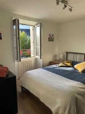 Un ou plusieurs lits dans un hébergement de l'établissement La casa d'Iza