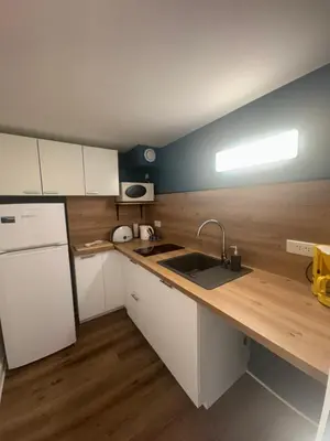 Cuisine ou kitchenette dans l'établissement La casa d'Iza