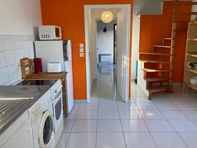 Cuisine ou kitchenette dans l'établissement super appartement
