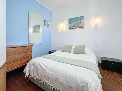 Un ou plusieurs lits dans un hébergement de l'établissement Holiday Home Les Volets Bleus by Interhome