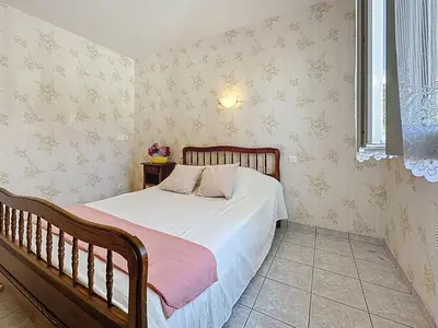 Un ou plusieurs lits dans un hébergement de l'établissement Holiday Home Epicea by Interhome