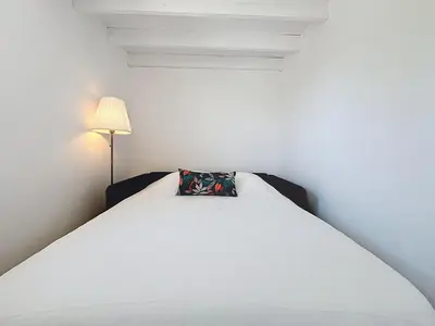 Un ou plusieurs lits dans un hébergement de l'établissement Holiday Home Plein Océan-5 by Interhome