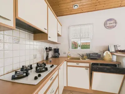 Cuisine ou kitchenette dans l'établissement Jardin et véranda - Maison 4 adultes 2 enfants