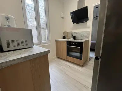 Cuisine ou kitchenette dans l'établissement Appartement 2 personnes - Angers