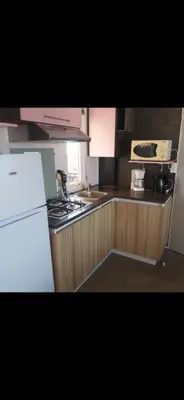 Cuisine ou kitchenette dans l'établissement Mobil-home 3 chambres 6 personnes