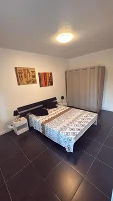 Un ou plusieurs lits dans un hébergement de l'établissement Logement calme entre Terre et Mer