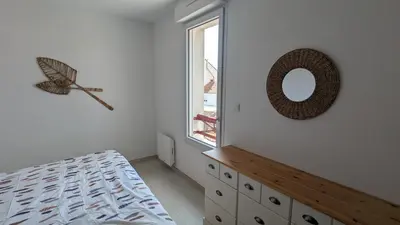 Un ou plusieurs lits dans un hébergement de l'établissement Cocon moderne avec terrasse a deux pas de locean