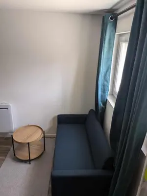 Coin salon dans l'établissement Appartement - Angers