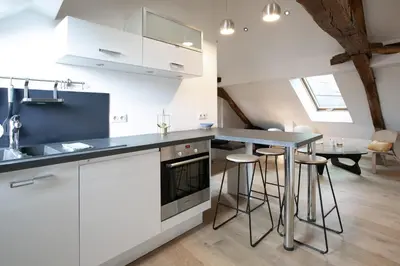 Cuisine ou kitchenette dans l'établissement Là-Haut - Wifi - Centre-ville