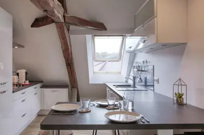 Cuisine ou kitchenette dans l'établissement Là-Haut - Wifi - Centre-ville
