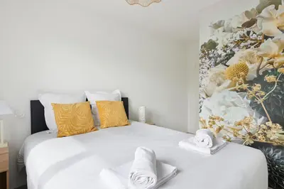 Un ou plusieurs lits dans un hébergement de l'établissement Les Lambannières - Maison neuve, calme avec jardin