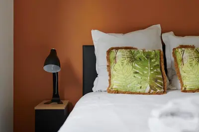 Un ou plusieurs lits dans un hébergement de l'établissement Les Lambannières - Maison neuve, calme avec jardin