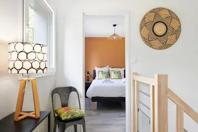 Un ou plusieurs lits dans un hébergement de l'établissement Les Lambannières - Maison neuve, calme avec jardin