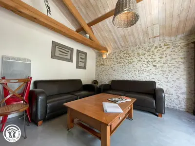 Coin salon dans l'établissement Maison plain-pied au cœur du Marais breton, proche plages et Ile d'Yeu - FR-1-426-589