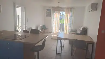 Coin salon dans l'établissement Jolie maison au calme