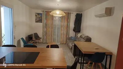 Coin salon dans l'établissement Jolie maison au calme