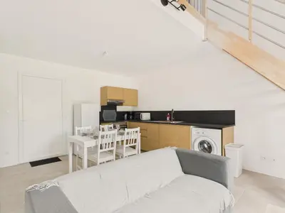 Cuisine ou kitchenette dans l'établissement Appartement pour 4 à St-Jean-de-Mont - Jardin